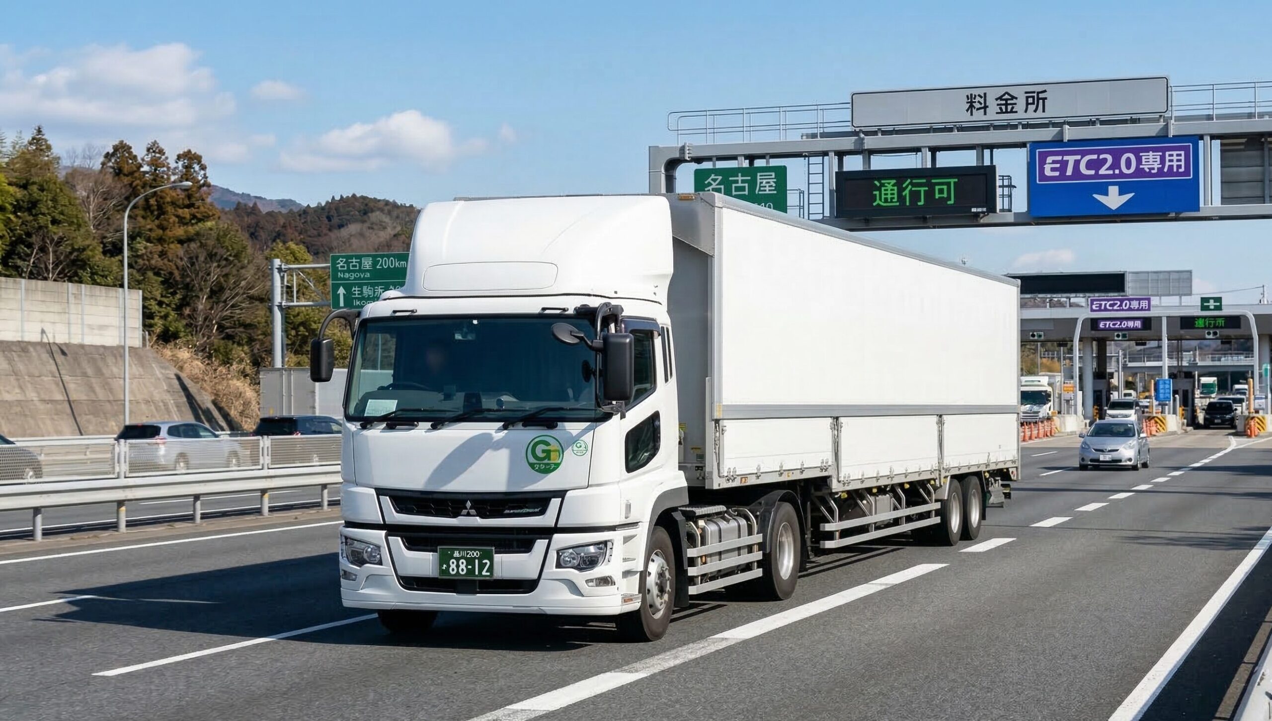 高速道路を走行する大型トラックとETC2.0レーン｜許可期間延長のイメージ